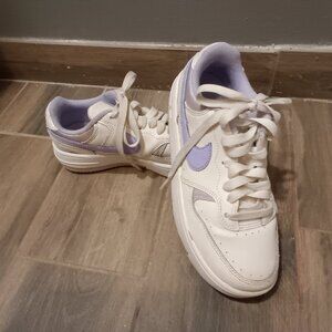 White and Purple Nike Sneakers.